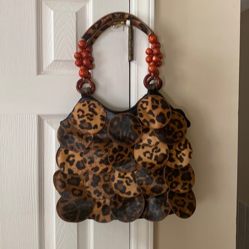 Beautiful leopard shoulder bag with beaded detail.